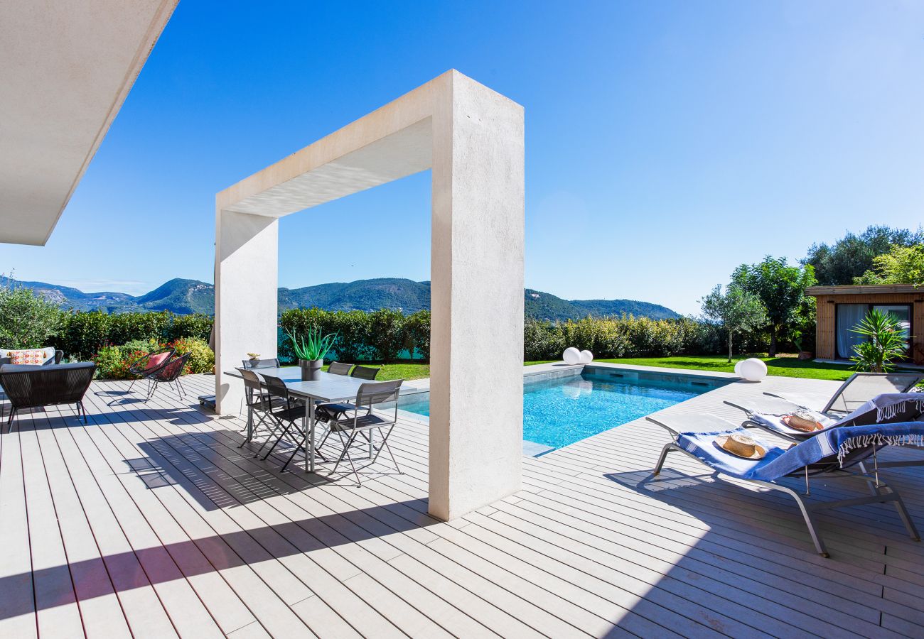 Swimming pool with deckchair